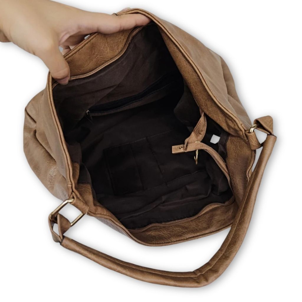 Bolsa feminina grande Agnes Mayzê. Couro ecológico, alta capacidade e alça transversal. Ideal para trabalho, faculdade e viagens com estilo e praticidade.