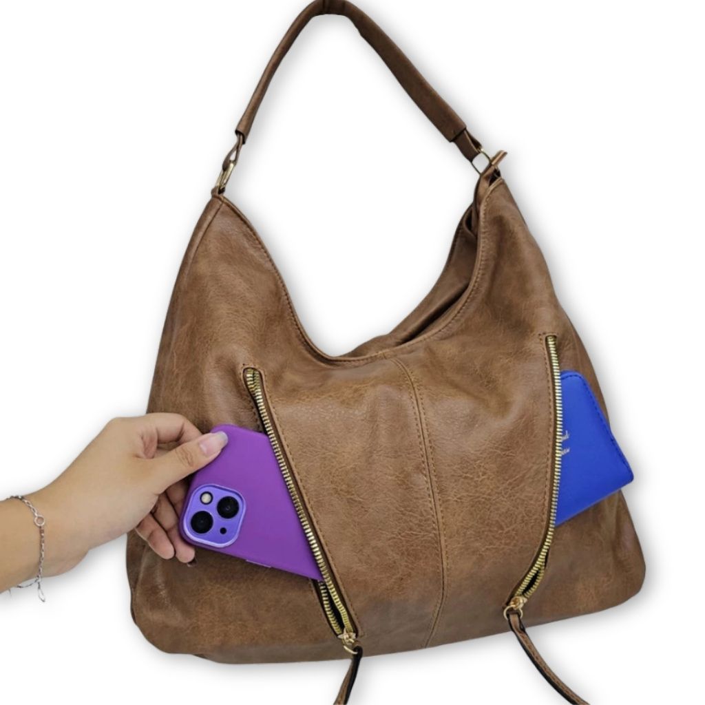 Bolsa feminina grande Agnes Mayzê. Couro ecológico, alta capacidade e alça transversal. Ideal para trabalho, faculdade e viagens com estilo e praticidade.