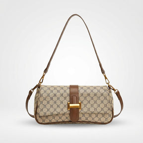 Bolsa baguete Yeda Mayzê. Design retrô em couro ecológico, estampa clássica e alça transversal. O acessório perfeito para looks modernos e sofisticados.