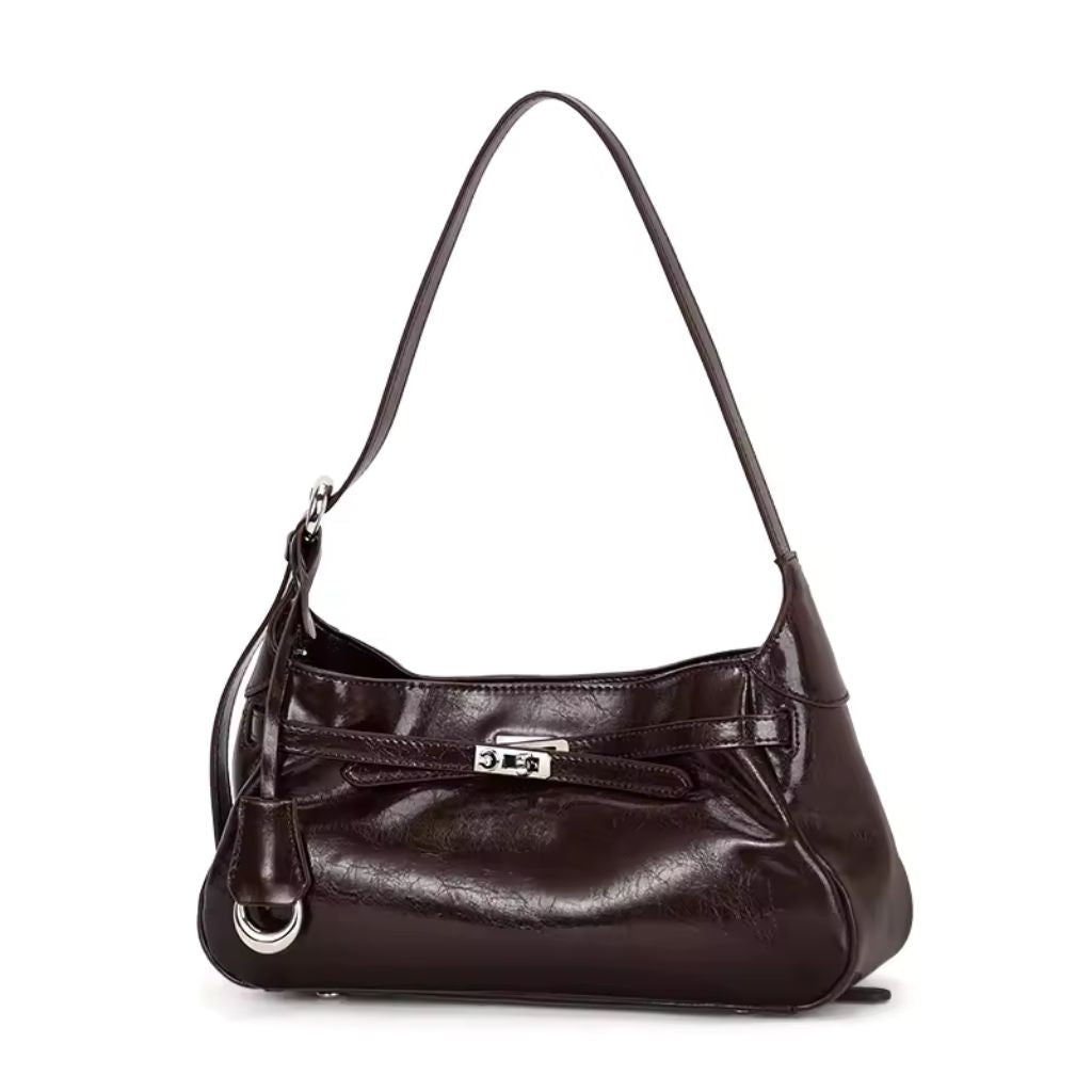 Bolsa hobo Lili Mayzê em couro legítimo. Design sofisticado, alça ajustável e divisórias internas. O toque de luxo e durabilidade que seu look merece.