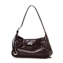 Bolsa hobo Lili Mayzê em couro legítimo. Design sofisticado, alça ajustável e divisórias internas. O toque de luxo e durabilidade que seu look merece.