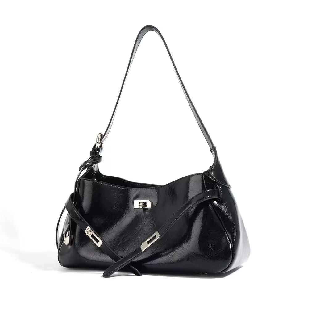 Bolsa hobo Lili Mayzê em couro legítimo. Design sofisticado, alça ajustável e divisórias internas. O toque de luxo e durabilidade que seu look merece.