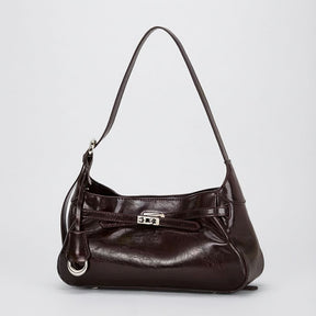 Bolsa hobo Lili Mayzê em couro legítimo. Design sofisticado, alça ajustável e divisórias internas. O toque de luxo e durabilidade que seu look merece.