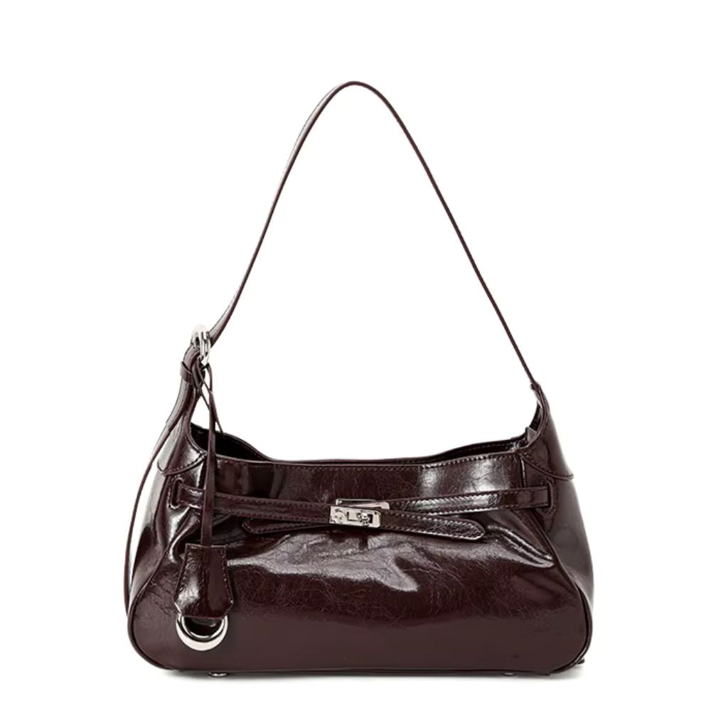 Bolsa hobo Lili Mayzê em couro legítimo. Design sofisticado, alça ajustável e divisórias internas. O toque de luxo e durabilidade que seu look merece.