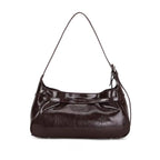Bolsa hobo Lili Mayzê em couro legítimo. Design sofisticado, alça ajustável e divisórias internas. O toque de luxo e durabilidade que seu look merece.