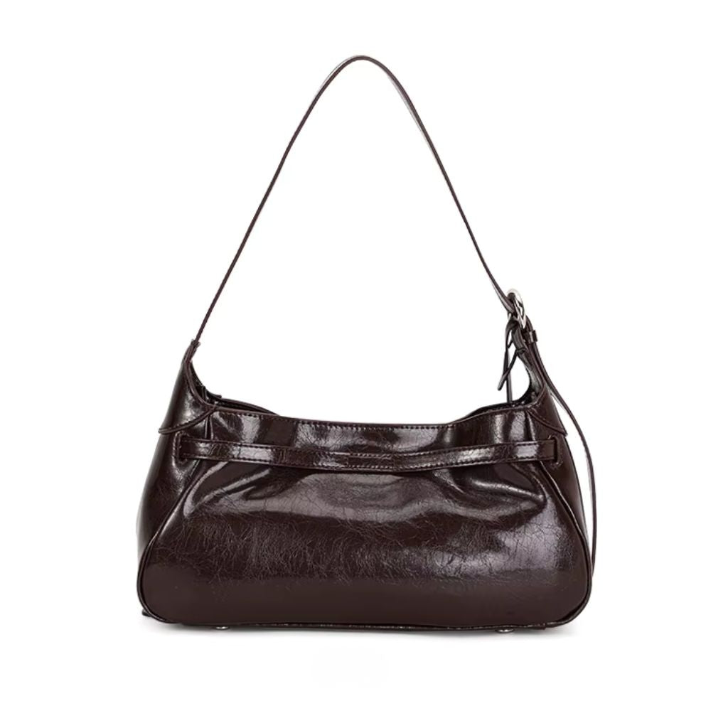 Bolsa hobo Lili Mayzê em couro legítimo. Design sofisticado, alça ajustável e divisórias internas. O toque de luxo e durabilidade que seu look merece.