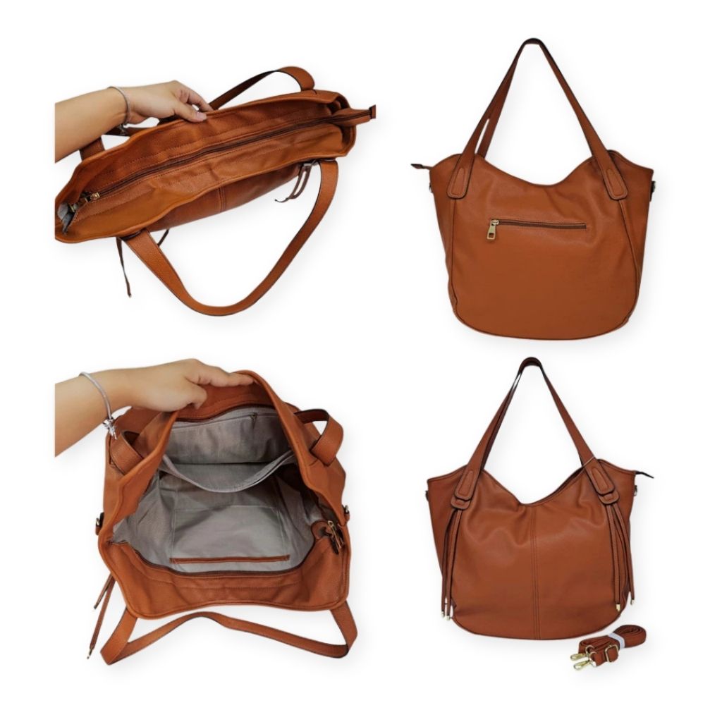 Bolsa maxi Gilian Mayzê. Grande capacidade, 3 compartimentos, bolso com zíper e alça transversal removível. Ideal para trabalho e dia a dia com estilo.