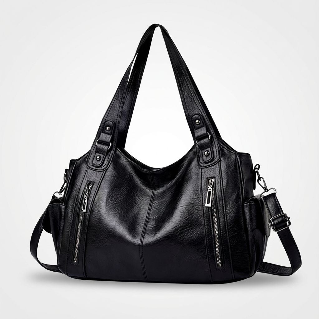 Bolsa média tote Naomi Mayzê. Couro ecológico, vários bolsos, alça transversal removível e ótima organização para o dia a dia.