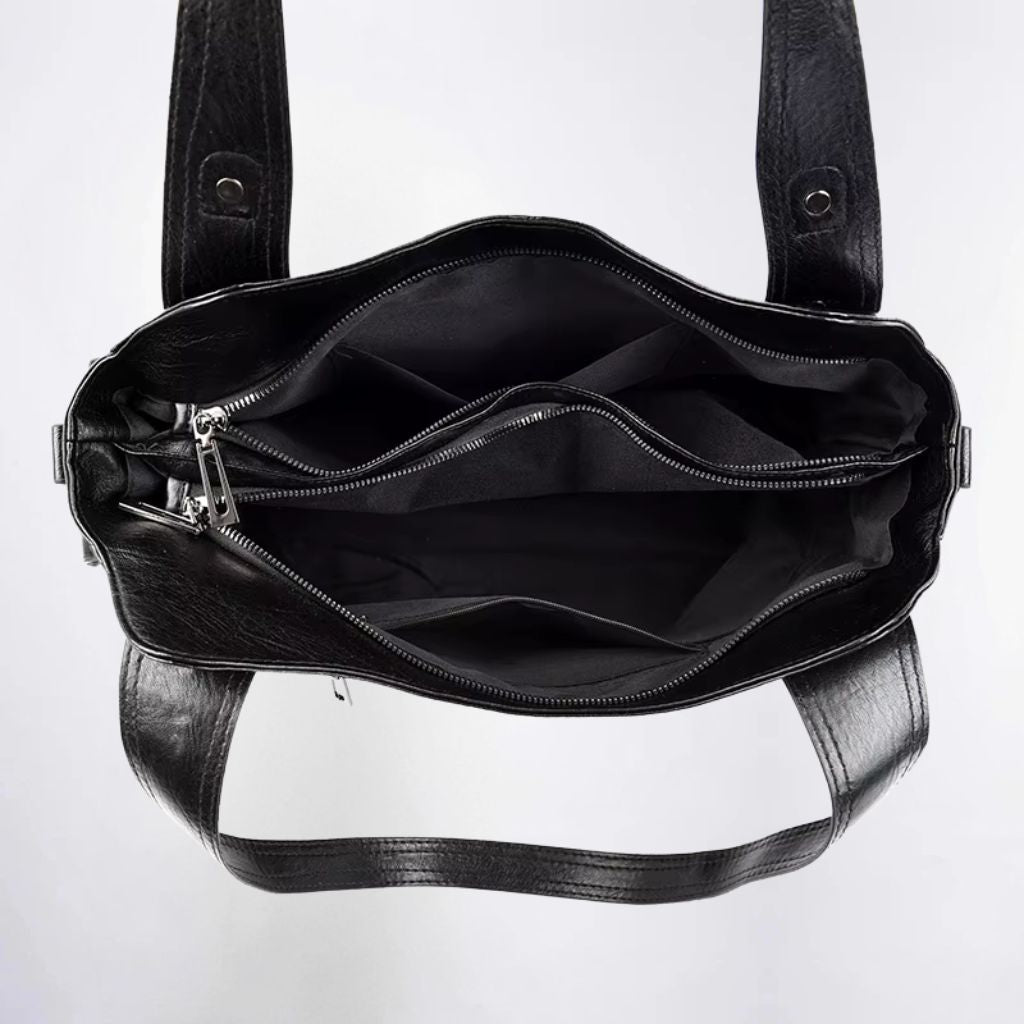 Bolsa média tote Naomi Mayzê. Couro ecológico, vários bolsos, alça transversal removível e ótima organização para o dia a dia.