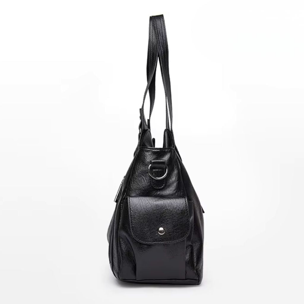 Bolsa média tote Naomi Mayzê. Couro ecológico, vários bolsos, alça transversal removível e ótima organização para o dia a dia.