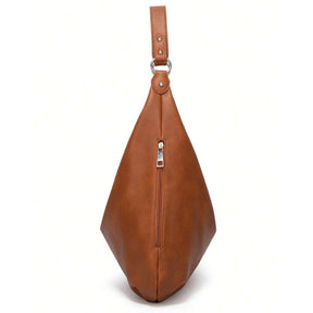 Bolsa de ombro grande Hermione Mayzê. Modelo hobo maxi em couro ecológico, fechamento em zíper e bolso interno. Elegante para trabalho e dia a dia.
