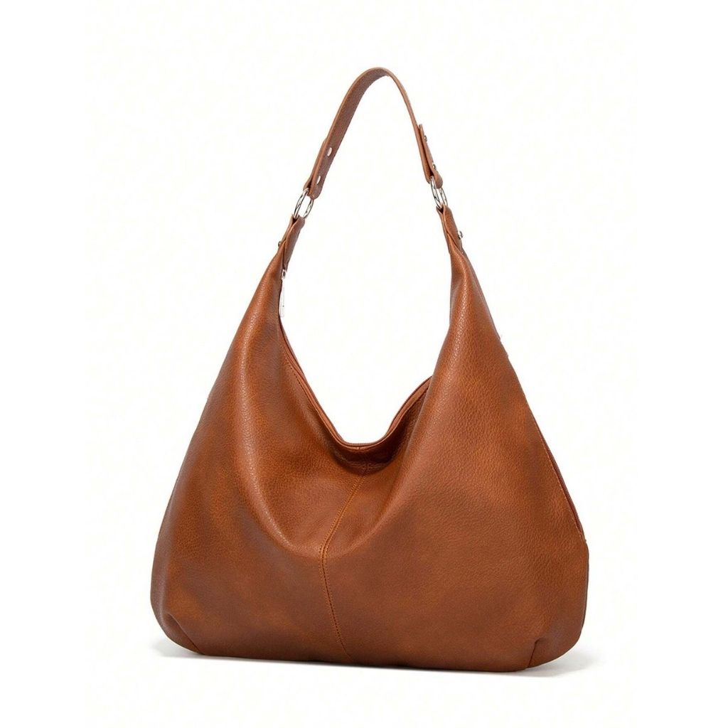 Bolsa de ombro grande Hermione Mayzê. Modelo hobo maxi em couro ecológico, fechamento em zíper e bolso interno. Elegante para trabalho e dia a dia.