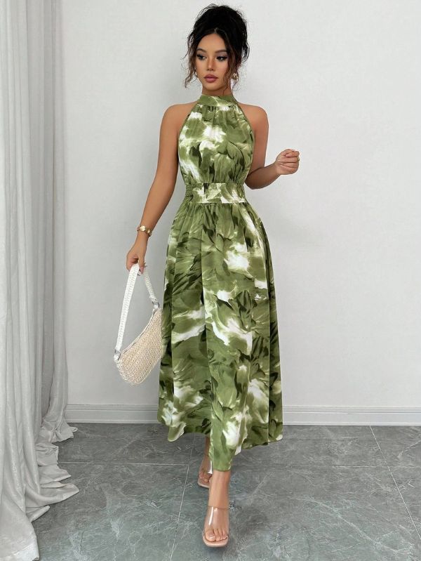 Vestido longo conceitual Abstrait Mayzê. Estampa abstrata, cintura alta marcada e caimento boho elegante para festas, jantares e noites de verão.