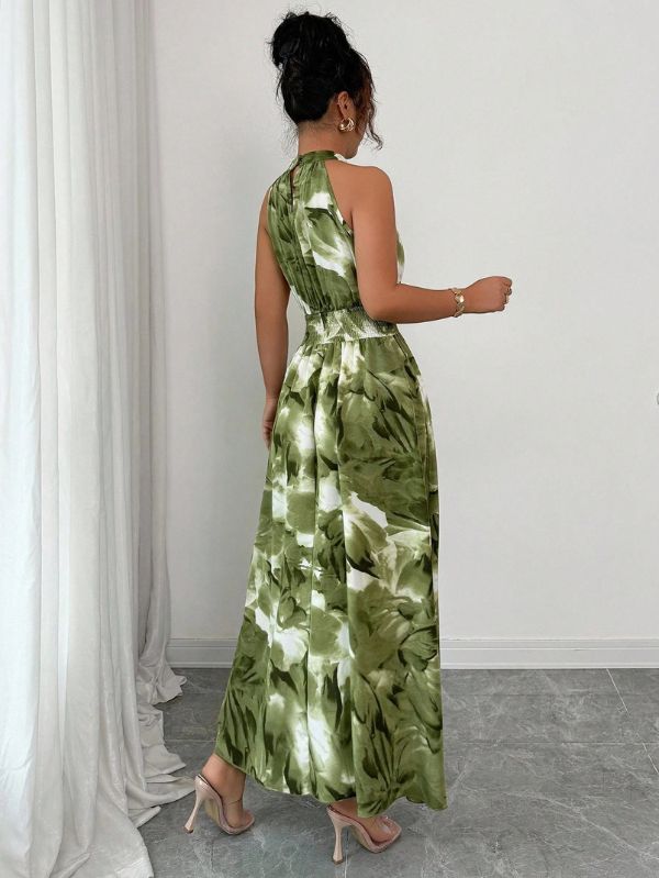 Vestido longo conceitual Abstrait Mayzê. Estampa abstrata, cintura alta marcada e caimento boho elegante para festas, jantares e noites de verão.