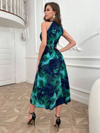 Vestido longo conceitual Abstrait Mayzê. Estampa abstrata, cintura alta marcada e caimento boho elegante para festas, jantares e noites de verão.
