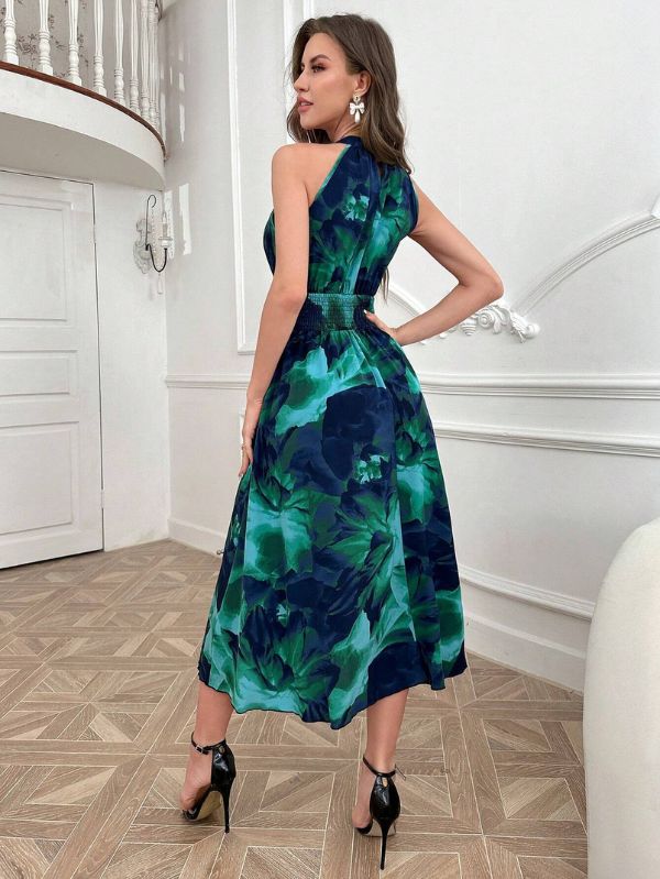 Vestido longo conceitual Abstrait Mayzê. Estampa abstrata, cintura alta marcada e caimento boho elegante para festas, jantares e noites de verão.
