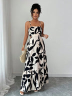 Vestido maxi Arbre Mayzê. Cintura marcada, recortes laterais e estampa boho para looks frescos e elegantes na praia e no verão.