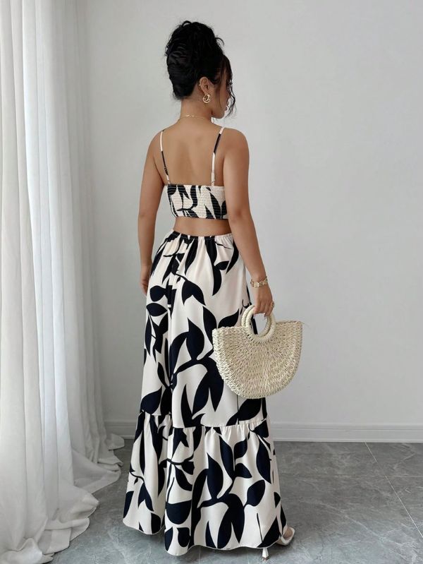 Vestido maxi Arbre Mayzê. Cintura marcada, recortes laterais e estampa boho para looks frescos e elegantes na praia e no verão.