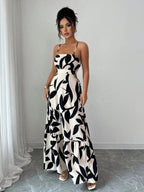 Vestido maxi Arbre Mayzê. Cintura marcada, recortes laterais e estampa boho para looks frescos e elegantes na praia e no verão.
