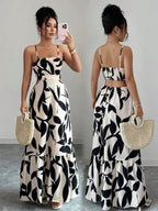 Vestido maxi Arbre Mayzê. Cintura marcada, recortes laterais e estampa boho para looks frescos e elegantes na praia e no verão.
