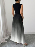 Vestido maxi degradê plissado Doux Mayzê. Saia plissada em A, cintura alta e caimento elegante para festas e eventos noturnos.