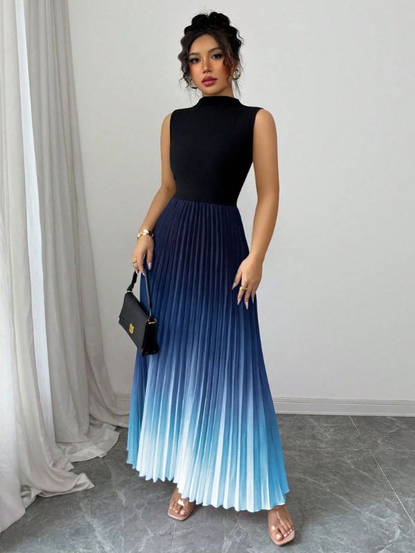 Vestido maxi degradê plissado Doux Mayzê. Saia plissada em A, cintura alta e caimento elegante para festas e eventos noturnos.