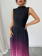 Vestido maxi degradê plissado Doux Mayzê. Saia plissada em A, cintura alta e caimento elegante para festas e eventos noturnos.