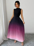 Vestido maxi degradê plissado Doux Mayzê. Saia plissada em A, cintura alta e caimento elegante para festas e eventos noturnos.