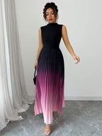 Vestido maxi degradê plissado Doux Mayzê. Saia plissada em A, cintura alta e caimento elegante para festas e eventos noturnos.