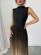 Vestido maxi degradê plissado Doux Mayzê. Saia plissada em A, cintura alta e caimento elegante para festas e eventos noturnos.